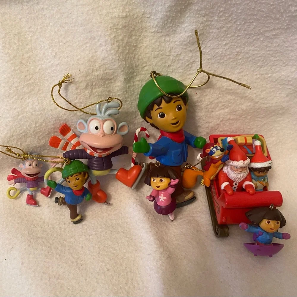 Go Diego and Dora holiday ornament characters with boots, swiped and Santa too!